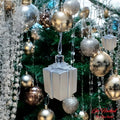 GoHooked silver gift box Christmas ornaments with glitter accents, part of a festive tree decor set.
