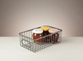 GoHooked silver metal wire grid storage basket bin with handles, holding jars of jam.
