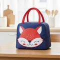 GoHooked dark blue Oxford cloth lunch bag with a cute smiley fox design and red handles. Thermal insulated tote.