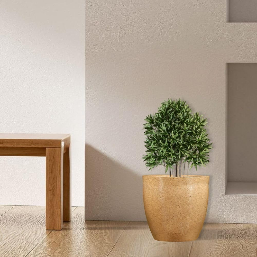 GoHooked Pluto 24 inch speckled tan polymer planter pot with a live plant. Modern round pot for living room or balcony.
