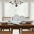 Go Hooked 22-piece speckled white melamine dinnerware set with plates, bowls, and serving spoon.