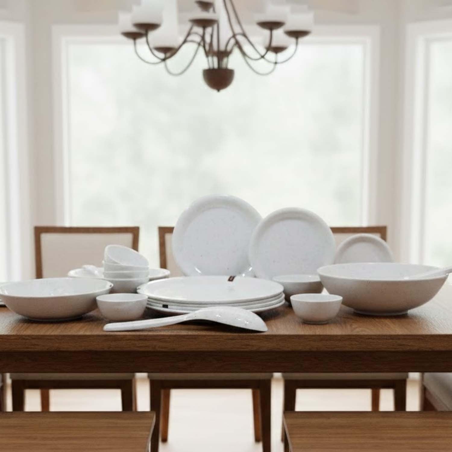 Go Hooked 22-piece speckled white melamine dinnerware set with plates, bowls, and serving spoon.
