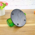 GoHooked green spin the bottle drinking game with black base and anti-slip feet on a wooden table.