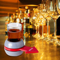 GoHooked Spin the Shot drinking game with a shot glass and red spinner arrow on a bar counter.