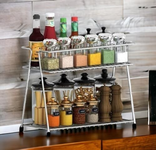 GoHooked stainless steel 2-tier shelf basket organizer with spice jars, condiment bottles, and pepper grinders.