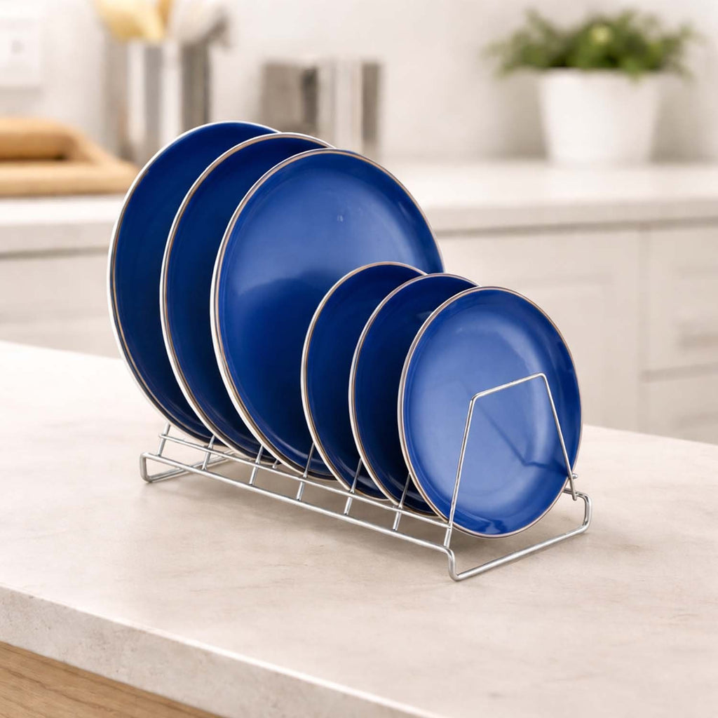 GoHooked stainless steel plate rack holding blue dinner plates on a kitchen countertop