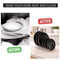 GoHooked stainless steel plate stand organizer with 6 slots holding black plates on a kitchen counter.