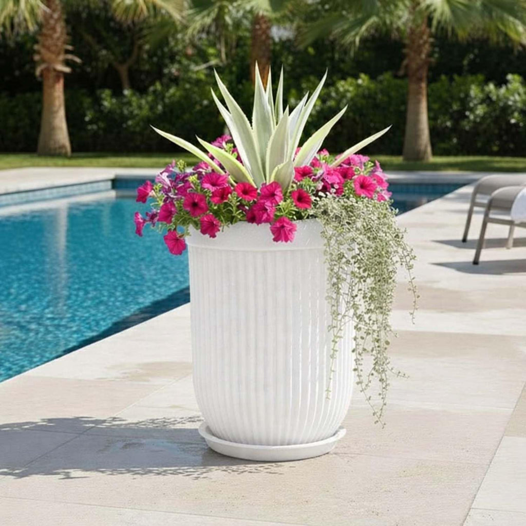 GoHooked 24-inch tall white ribbed polymer floor planter with a metallic gold accent, displayed by a swimming pool.