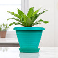GoHooked teal plastic planter pot with saucer, 6 inch modern design for indoor/outdoor plants.