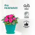 GoHooked teal plastic planter pot with saucer, featuring a modern twister design and pink flowers. Suitable for indoor/outdoor use.