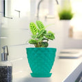 GoHooked teal diamond-patterned plastic planter pot with saucer, 6 inch, for indoor/outdoor plants.