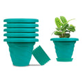GoHooked set of 6 teal plastic planter pots with saucers, featuring a modern twister design for indoor/outdoor plants.