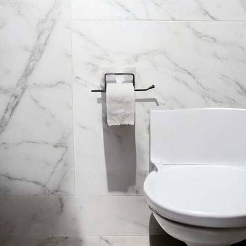 GoHooked black rustproof metal toilet paper holder with self-adhesive installation on marble tile wall.
