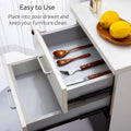 GoHooked transparent EVA anti-slip shelf liner in an open drawer with wooden spoons and cutlery.