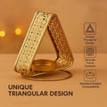 GoHooked matte gold triangular metal tealight holder with floral cutwork design. Holds standard tealights.