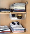 Go Hooked white metal undershelf basket holding folded clothes, socks, and a belt. Set of 2.