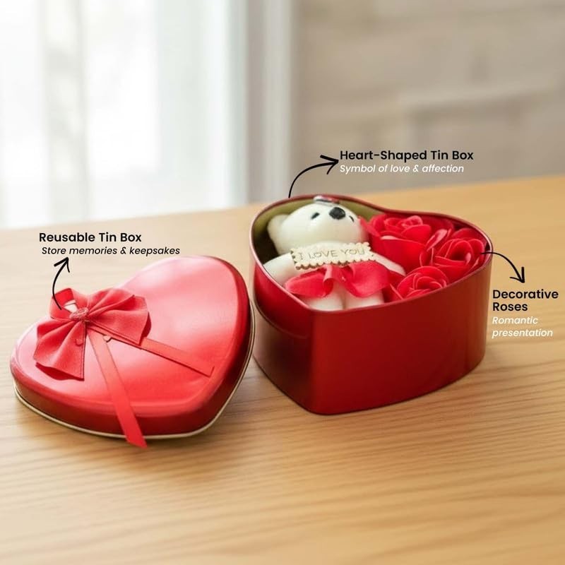GoHooked red heart-shaped tin box with a white teddy bear holding an "I Love You" sign and decorative roses.