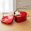 GoHooked red heart-shaped tin box with a white teddy bear holding an "I Love You" sign and decorative roses.