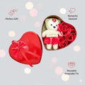 GoHooked Valentine's Day gift set featuring a white teddy bear with "I Love You" sign and red roses in a heart-shaped tin box.