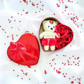 GoHooked Valentine's Day teddy bear in heart box with red roses and "I Love You" sign.