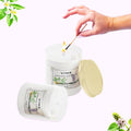 GoHooked ViMe white aroma candle with Neroli & Patchouli fragrance, 120ml jar, lit by a match.