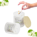 GoHooked ViMe Mogra Mist aroma candle in a white jar, lit with a match. 120 gm, 35 hr burn time.