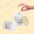 GoHooked ViMe Pumpkin Spice scented candle in a white jar, lit with a match. Aromatherapy benefits, 120 gm, 35 hr burn time.