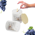 GoHooked ViMe white aroma candle with Winelone fragrance, 120 gm, 35-hour burn time, in a glass jar with gold lid.