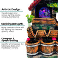 Go Hooked multicolour polyresin tabletop waterfall fountain with LED lights and adjustable speed control. Features tiered rockery and wooden bucket basins.