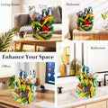 GoHooked multicolour polyresin tabletop waterfall fountain with owls and LED lights. Features adjustable speed control.