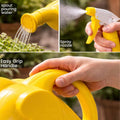GoHooked 2-in-1 elephant-shaped watering can and spray bottle, 1.5L, yellow plastic with long spout and easy grip handle.