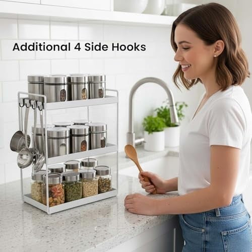 Go Hooked white 3-tier standing rack with 4 side hooks, holding spice jars and kitchen utensils on a countertop.