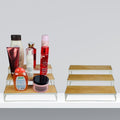 GoHooked white 3-tier wooden shelf organizer with metal frame, displaying various cosmetic and bath products.