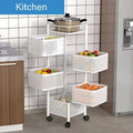 Go Hooked white 5-layer rotating kitchen trolley organizer with square baskets holding fruits, vegetables, and kitchenware.