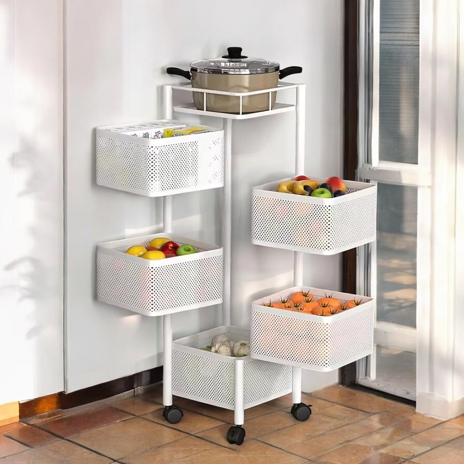Go Hooked white 5-tier rotating storage trolley with perforated baskets holding fruits, vegetables, and a pot.
