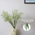 GoHooked white artificial baby's breath flowers with flexible stems in a decorative vase. Realistic rubber flower heads and plastic stems.