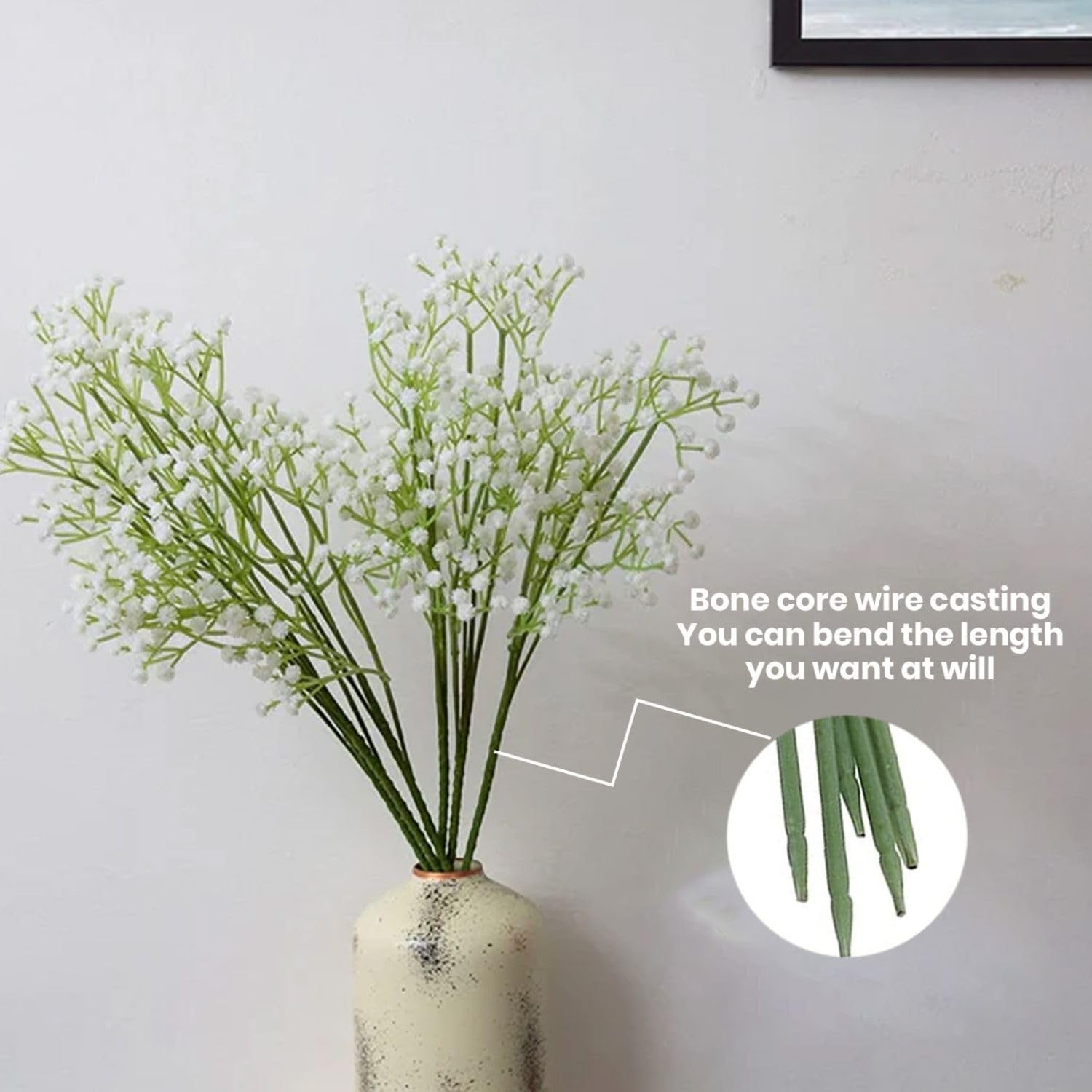 GoHooked white artificial baby's breath flowers with flexible stems in a decorative vase, perfect for floral arrangements.