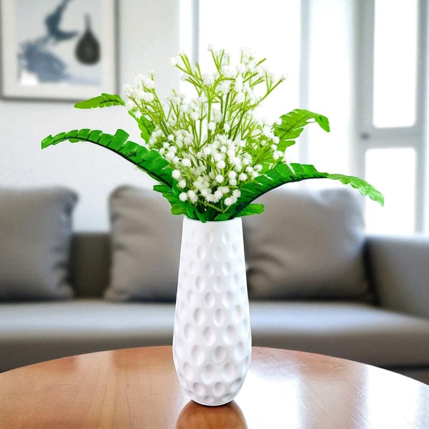 Go Hooked white artificial baby's breath flowers in a textured white vase, perfect for wedding bouquets and home decor.