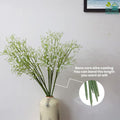 GoHooked white artificial baby's breath flowers with flexible stems, made of soft rubber and plastic, perfect for floral arrangements.