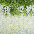 GoHooked white artificial wisteria vine silk flowers garland, 3.6 ft each, 12 pack. Realistic petals and green leaves.