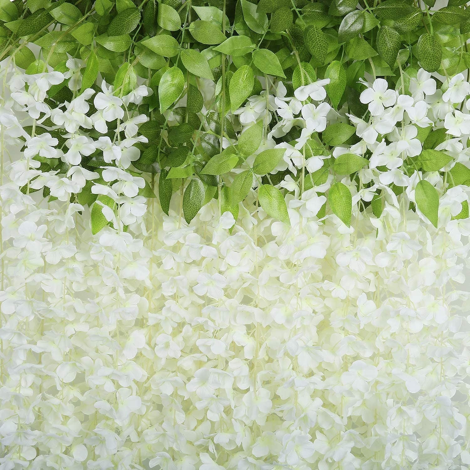 GoHooked white artificial wisteria vine silk flowers garland, 3.6 ft each, 12 pack. Realistic petals and green leaves.