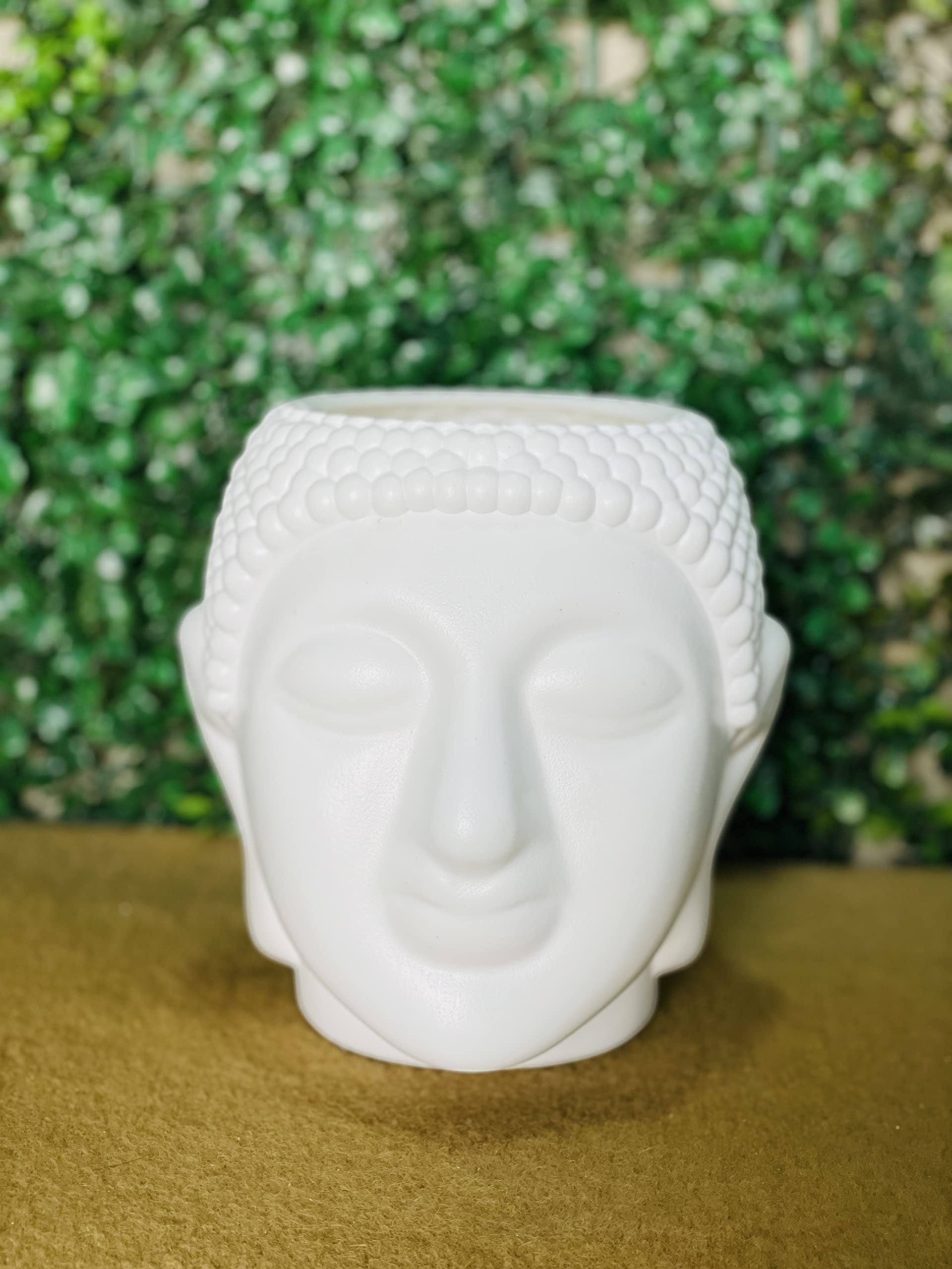 GoHooked white plastic Buddha head shaped planter pot, perfect for home decor and office spaces.