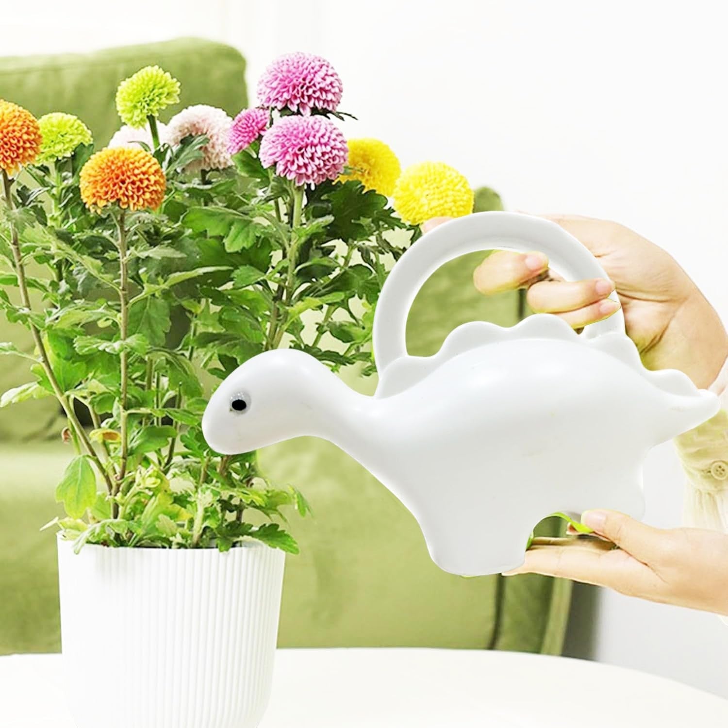 GoHooked white plastic dinosaur watering can, 1 liter capacity, for kids and house plants.