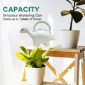 GoHooked white plastic dinosaur watering can, 1 liter capacity, for kids and house plants.