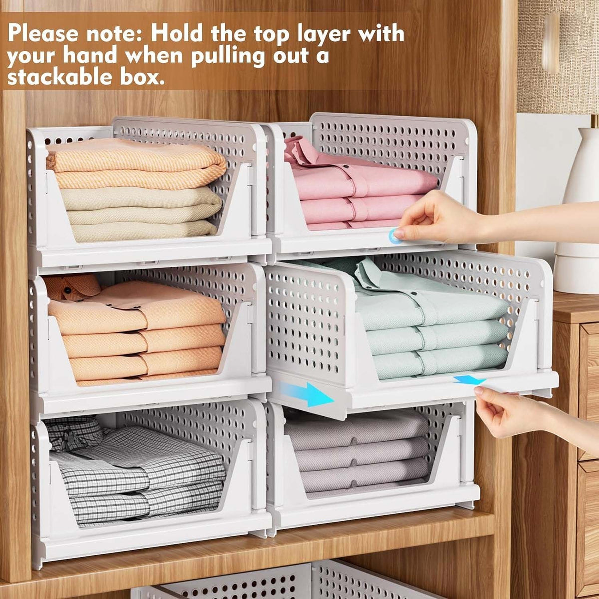 GoHooked white foldable plastic wardrobe organizers stacked in a cupboard with clothes inside and pull-out drawers.