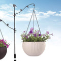 GoHooked white woven-look plastic hanging planter with purple flowers, 7.1 inch diameter, 13 inch chain.