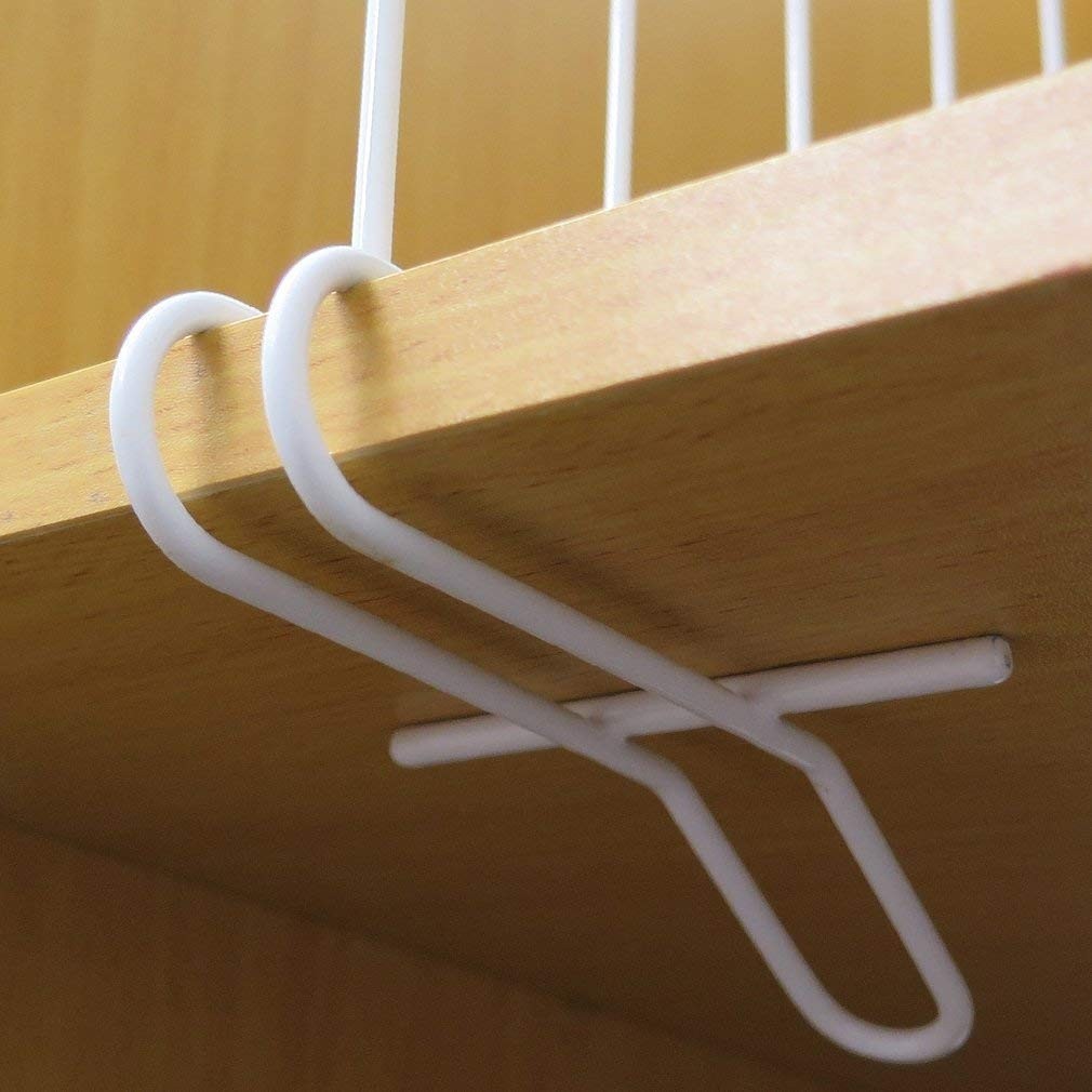 Go Hooked white coated iron shelf dividers clip onto wooden shelves to organize closets and maximize space.