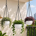 GoHooked pack of 3 white marble textured polymer hanging planter pots with black metal chains, 7 inch round decorative pots for indoor/outdoor plants.