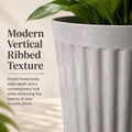 GoHooked 8-inch round plastic planter with a white marble texture and modern vertical ribbed design for home decor