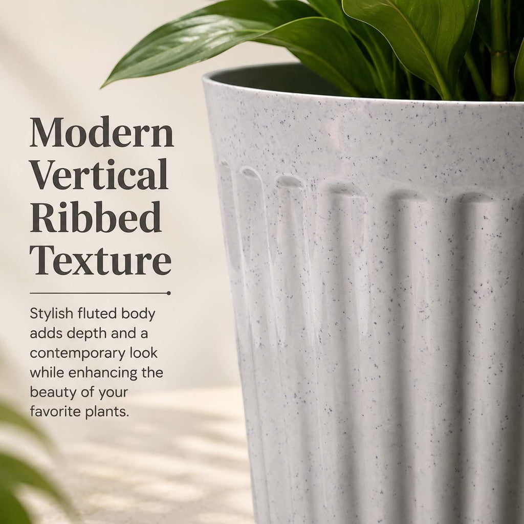 GoHooked round plastic planter pot with a white marble texture and modern vertical ribbed design for indoor plants